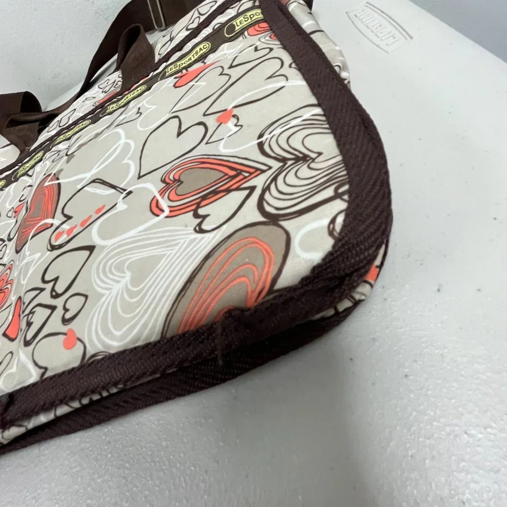 Le Sportsac computer messenger bag 11 x 15 hearts pink brown shoulder strap